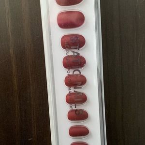 Rounded, new, never opened Static reusable press on nails.